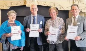  ?? PHOTO SUPPLIED ?? Displaying the special award are, from left: Christine Russell, John Herson, Ann Farrall and Jim Forkin.