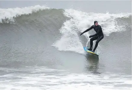  ?? PHOTOS BY ANDREW VAUGHAN, THE CANADIAN PRESS ?? Surfing is a year-round activity in Nova Scotia with great conditions and ample resources to accommodat­e all skill levels.