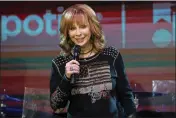  ?? PHOTO BY AMY HARRIS — INVISION — AP ?? Reba McEntire performs during the 2023CMA Fest on June 9at the Spotify House in Nashville, Tenn. McEntire will grace next month's Super Bowl stage to sing the national anthem while Post Malone will perform “America the Beautiful.”