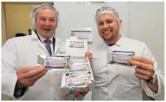  ?? Photo by Domnick Walsh ?? Niall Harty presents to then Taoiseach Enda Kenny a bar called ‘An Taoiseach Bar ‘ at the official opening of The Kerry Food Hub.