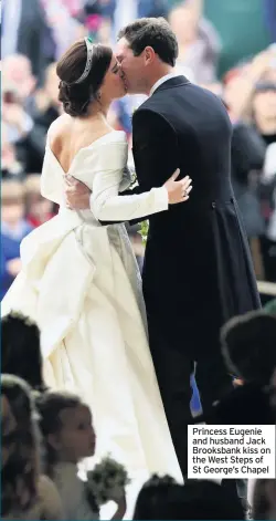  ??  ?? Princess Eugenie and husband Jack Brooksbank kiss on the West Steps of St George’s Chapel