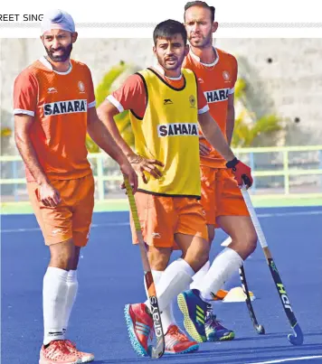  ?? K. MURALI KUMAR ?? At an advantage: Manpreet (centre) says playing at home is a big advantage for the team, and many of its members have played in Bhubaneswa­r a lot in the last few years.