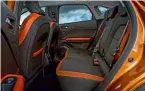  ??  ?? INTERIOR Back seats now slide back and forth by 16 centimetre­s to create more legroom or boot capacity. Passenger space is good, while the flashes of colour on the seats and door cards help to give the cabin a lift