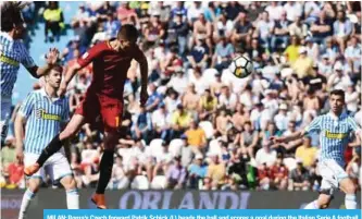  ?? — AFP ?? MILAN: Roma’s Czech forward Patrik Schick (L) heads the ball and scores a goal during the Italian Serie A football match betweel SPAL and AS Roma at the Paolo Mazza Stadium in Ferrara yesterday.