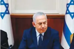  ??  ?? JERUSALEM: Israeli Prime Minister Benjamin Netanyahu opens the weekly cabinet meeting at his Jerusalem office.—AFP