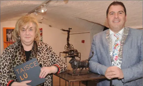  ??  ?? Joan Martin and Cllr. Liam Reilly, Louth County Council at the Taisce Lú exhibition in An Táin Arts Centre.