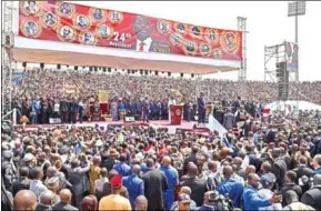  ?? ISSOUF SANOGO/AFP ?? Liberia’s President-elect George Weah (centre on stage) delivers a speech before his swearing-in ceremony on Monday in Monrovia.