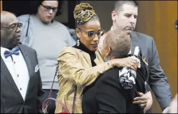  ?? Hans Pennink The Associated Press ?? Friends and family attend a funeral Mass for eight of the 20 people killed in an Oct. 6 limousine crash in Schoharie, N.Y., Saturday at St. Stanislaus Roman Catholic Church on Saturday in Amsterdam, N.Y.