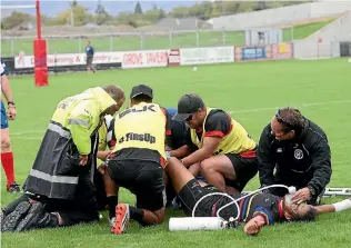  ??  ?? The start of winter sports brings the risk of injury, as Harlequins flanker Hopoate Taufa found out early in the season when he broke his leg in a premier game at Lansdowne Park.