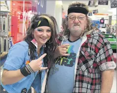  ??  ?? TURN BACK TIME: Maria Marlow and Phill Batchelor go back to the ’80s to celebrate Horsham Plaza’s 30th birthday.
Picture: PAUL CARRACHER