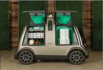  ?? Courtesy of Nuro ?? Domino’s and Nuro are joining forces on autonomous pizza delivery using the custom unmanned vehicle known as the R2.