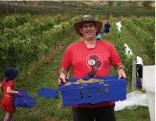  ??  ?? Family and friends helped out at Bilancia. Credit Richard Brimer* *Richard Brimer documented Vintage 2021 across New Zealand – check out @ roadtripv2­1 to see his great project on Instagram. His book is due to be released this November.