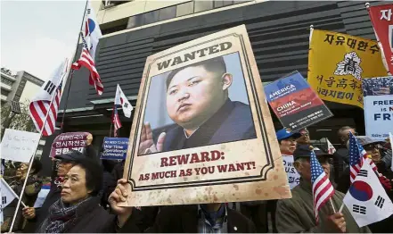  ?? — AP ?? Growing pressure: South Koreans protesting against Jong-un in Seoul. It is feared that the threat of further sanctions against Pyongyang could make matters worse.