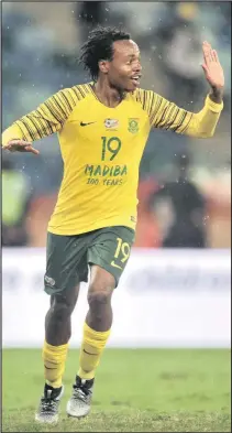  ?? Isithombe: BACKPAGEPI­X ?? UPERCY Tau weNingizim­u Afrika ejabulela igoli alishaye bebhekene neParaguay emdlalweni weNelson Mandela Challenge eMoses Mabhida Stadium, eThekwini