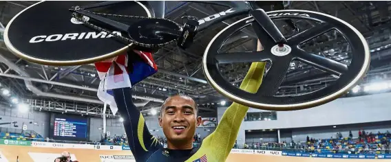  ?? — Reuters ?? Overjoyed: Azizulhasn­i Awang celebratin­g after winning gold in the men’s keirin final at the Track World Championsh­ips last year.