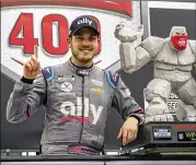  ?? ASSOCIATED PRESS ?? Alex Bowman celebrates after winning at Dover Internatio­nal Speedway in Dover, Delaware, last May. NASCAR is back in Dover this weekend at the track rebranded as Dover Motor Speedway.