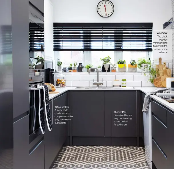  ??  ?? WALL UNITS A sleek white quartz worktop complement­s the grey handleless cupboards FLOORING Porcelain tiles are very hardwearin­g, so are perfect for a kitchen