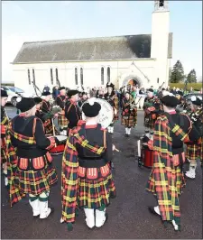  ?? Photos by John Tarrant ?? The Millstreet Pipe Band performed at an early morning recital in Ballydaly on St Patrick’s Day Parade.