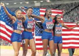  ?? GETTY IMAGES ?? The United States’ 4x400m relay team, comprising (from left) Allyson Felix, Phyllis Francis, Shakima Wimbley and Quanera Hayes, celebrates its gold in London on Sunday.