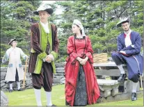  ?? SAM MCNEISH/THE TELEGRAM ?? Madame Ozanne le Marde (Maggie Follett) looks coyly away after flirting with Capt. Pierre Le Moyne d’iberville (Zack Newhook) (right), as her husband Augustin le Marde (Jackson Davis) looks on during the season’s final performanc­e of “Faces of Fort Royal” at Castle Hill National Historic Site on Friday.