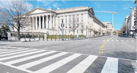  ?? ERIC BARADAT/GETTY-AFP ?? Investigat­ors are combing through computer networks used by several federal department­s, as well as nuclear laboratori­es, to determine the scope of a massive hacking operation. Above, the Treasury Department building.