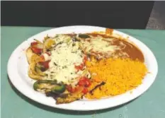  ?? STAFF PHOTO BY CHRIS ZELK ?? La Familia Mexican Restaurant’s chef’s specialty, Pollo Con Rajas.