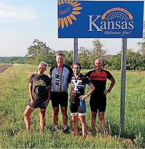  ?? [PHOTOS PROVIDED] ?? From left, Daphne Summers, Ron Ponder, Matt Schullman and Jeff Hauser stand on the Kansas border at the end of a long day on their bikes.