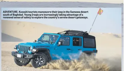  ?? ?? ADVENTURE. Kuwaiti tourists manoeuvre their jeep in the Samawa desert south of Baghdad. Young Iraqis are increasing­ly taking advantage of a renewed sense of safety to explore the country’s serene desert getaways.
