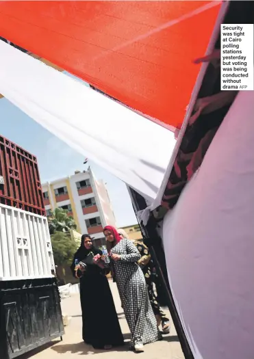  ?? AFP ?? Security was tight at Cairo polling stations yesterday but voting was being conducted without drama