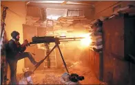  ?? AMER AL-MOHIBANY / AGENCE FRANCE-PRESSE ?? A rebel fighter from the Failaq al-Rahman brigade fires a heavy machine gun in Jobar, a district on the eastern outskirts of Damascus that was recaptured by government forces on Monday.