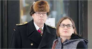  ?? ADRIAN WYLD / THE CANADIAN PRESS ?? Suspended Vice-Admiral Mark Norman and one of his lawyers, Christine Mainville, leave court in Ottawa on Friday.