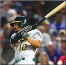  ?? RICHARD W. RODRIGUEZ/TRIBUNE NEWS SERVICE ?? Marcus Semien, seen here hitting a home run against the Rangers on June 7, hit a pair of dingers against the Twins on Thursday.