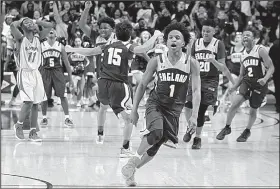  ?? Arkansas Democrat-Gazette/THOMAS METTHE ?? Kevante Davis (1) and the rest of England’s players celebrate after their double-overtime victory over Clarendon in the Class 2A boys state championsh­ip game Saturday at Hot Springs.