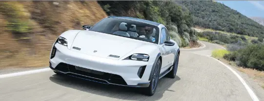  ?? PHOTOS: PORSCHE ?? Porsche claims 600 PS (about 590 horsepower) from the Mission E’s twin synchronou­s electric motor, making it very fast as it hugs the road.