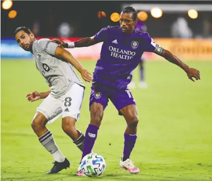  ?? EMILEE CHINN/GETTY IMAGES ?? Impact’s Saphir Taïder and Orlando’s Nani battle during the knockout round of the MLS is Back tourney last month.