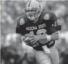  ?? Mike Powell, Getty Images ?? Arizona State QB Jake Plummer looks downfield during the Rose Bowl on Jan. 1, 1997.