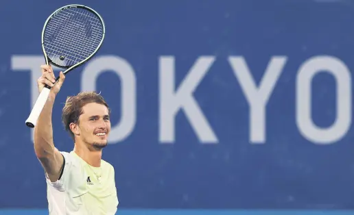  ??  ?? Germany’s Alexander Zverev celebrates after winning the Tokyo 2020 Olympics tennis men’s singles gold medal match against Karen Khachanov of the Russian Olympic Committee at the Ariake Tennis Park, Tokyo, Japan, Aug. 1, 2021.