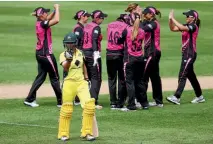  ?? PHOTO: GETTY IMAGES ?? The New Zealand women’s team celebrates the wicket of Ashleigh Gardner during their series-clinching win over Australia in Adelaide.