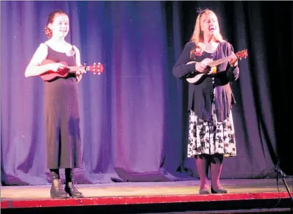  ??  ?? MOLLY Pawson and Helen Carver sang at the Community Board’s Anzac Concert in 2017.