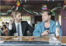  ?? DANIEL MCFADDEN/WARNER BROS. ?? Ryan Gosling, left, and Russell Crowe star in The Nice Guys, whose bar scene evokes a Dickensian spirit.