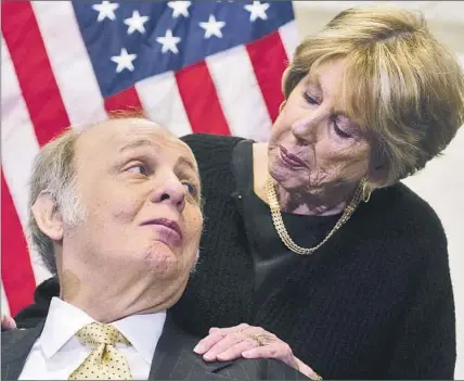  ?? Saul Loeb
AFP/Getty Images ?? A MISSION BORN OF TRAGEDY Sarah Brady, with her husband, Jim, in 2011, made it her mission to push for tighter gun regulation­s. Her husband, who was shot and partially paralyzed during the 1981 assassinat­ion attempt on President Ronald Reagan, became a...