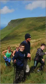  ??  ?? Hikers young and old joined the charity hike.