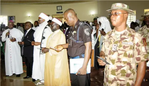  ?? Photo: NAN ?? The Commander, Operation Safe Haven in Plateau, Maj.-Gen. Augustine Agundu (right); Commission­er of Police, Plateau Command, Undie Adie (2nd right); some traditiona­l rulers and religious leaders, during the ‘Muslim-Christian Inter-faith Prayers Summit for Security’ in Jos yesterday