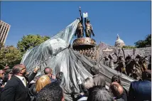  ?? DAVE CREANEY / AMERICAN-STATESMAN 2016 ?? The Texas African American History Memorial, which honors African-American contributi­ons to Texas history, is unveiled last November at the Capitol.