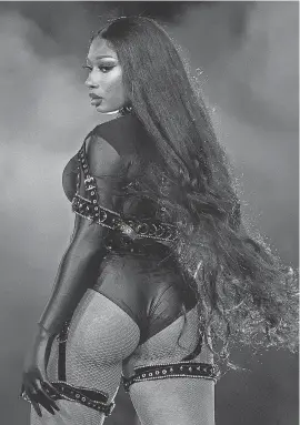  ?? RICH FURY/ GETTY IMAGES ?? Megan Thee Stallion is up for four Grammy Awards, including record of the year for “Savage.”