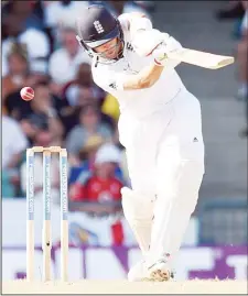  ??  ?? England’s batsman Jonathan Trott plays a shot to be LBW by West Indies cricketer Jerome Taylor during day two of the final match of a three-match Test series between England and West Indies at the Kensington Oval Stadium in
Bridgetown on May 2. (AFP)