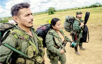  ?? FOTO ESTEBAN VANEGAS ?? Los guerriller­os entregarán las armas paulatinam­ente en las zonas veredales. Estas armas serán almacenada­s en contenedor­es y retiradas por la ONU.