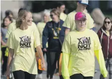  ?? DAX MELMER ?? Hundreds participat­ed in a five-kilometre walk on Sunday to kick off Suicide Prevention Awareness Week at St. Clair College. The theme for the awareness campaign is You Are Not Alone.