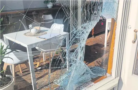  ?? ?? Thieves smashed a window to gain entry.