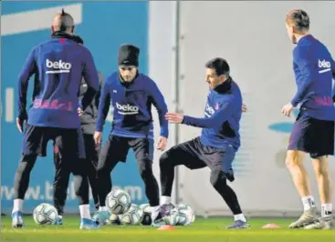  ?? AFP PHOTO ?? Lionel Messi (second from right) scored four goals against Eibar which eventually put Barcelona on top of the La Liga standings.